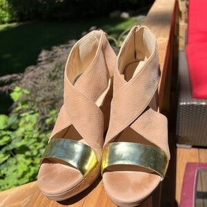 Cole Haan clogs with open toe and zipper back.
